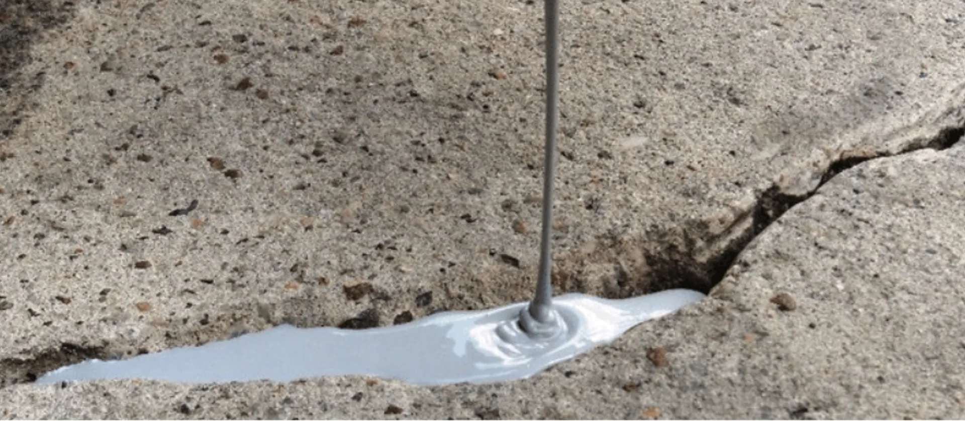 Crack repair on garage floor before coating