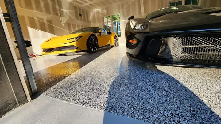 Polyaspartic flake garage floor with Ferrari supercar NJ